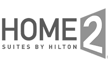 Home 2 Suites by Hilton logo